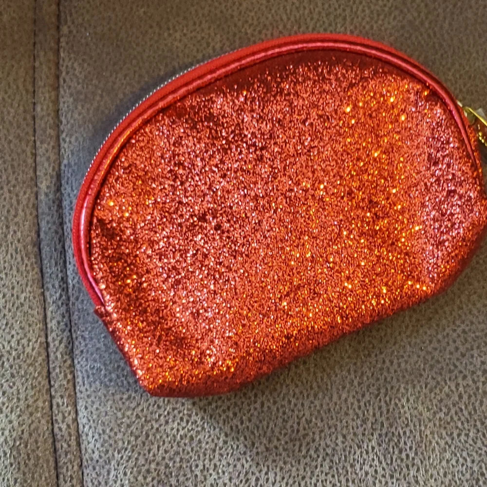 SeneGence red glitter makeup bag with foundation samples